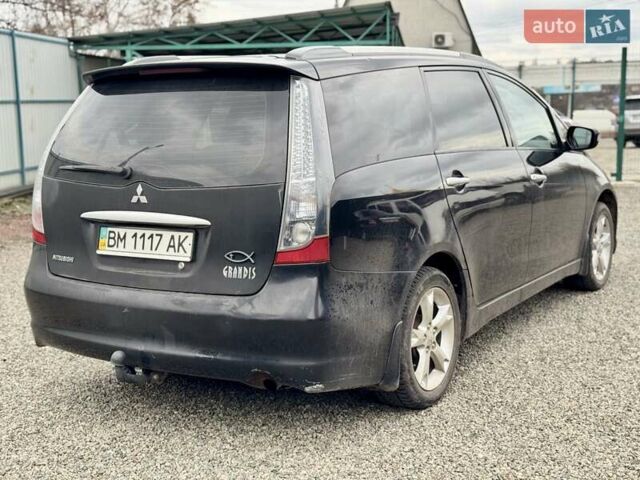 Черный Мицубиси Грандис, объемом двигателя 2.4 л и пробегом 185 тыс. км за 5899 $, фото 10 на Automoto.ua