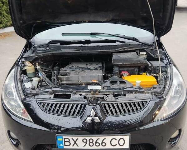Чорний Міцубісі Грандіс, об'ємом двигуна 2.4 л та пробігом 235 тис. км за 5999 $, фото 38 на Automoto.ua