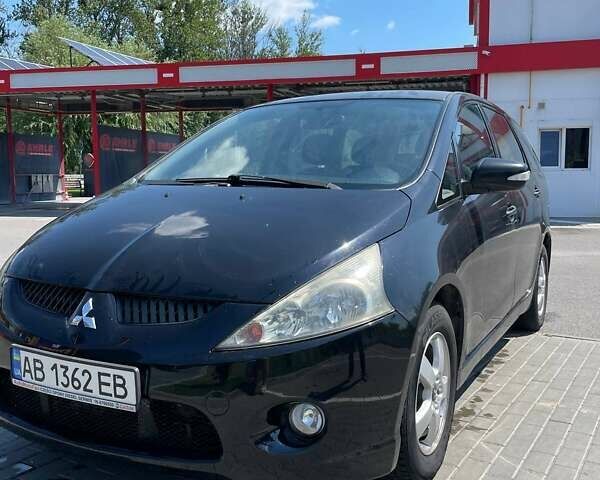 Черный Мицубиси Грандис, объемом двигателя 2 л и пробегом 228 тыс. км за 7600 $, фото 1 на Automoto.ua