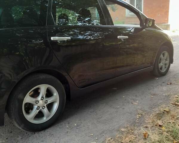 Чорний Міцубісі Грандіс, об'ємом двигуна 2 л та пробігом 290 тис. км за 6300 $, фото 7 на Automoto.ua