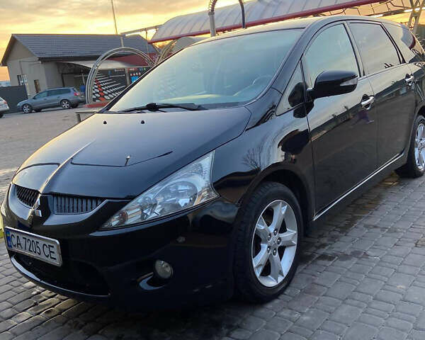 Черный Мицубиси Грандис, объемом двигателя 1.97 л и пробегом 377 тыс. км за 6999 $, фото 1 на Automoto.ua