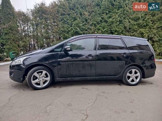 Чорний Міцубісі Грандіс, об'ємом двигуна 2.4 л та пробігом 235 тис. км за 5999 $, фото 2 на Automoto.ua