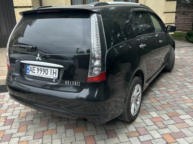 Чорний Міцубісі Грандіс, об'ємом двигуна 2.4 л та пробігом 137 тис. км за 9300 $, фото 1 на Automoto.ua