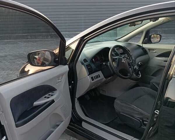 Черный Мицубиси Грандис, объемом двигателя 1.97 л и пробегом 261 тыс. км за 7400 $, фото 11 на Automoto.ua