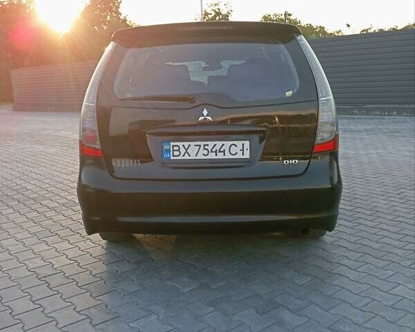 Черный Мицубиси Грандис, объемом двигателя 1.97 л и пробегом 261 тыс. км за 7400 $, фото 4 на Automoto.ua