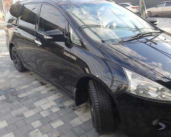 Черный Мицубиси Грандис, объемом двигателя 2.38 л и пробегом 253 тыс. км за 8700 $, фото 4 на Automoto.ua