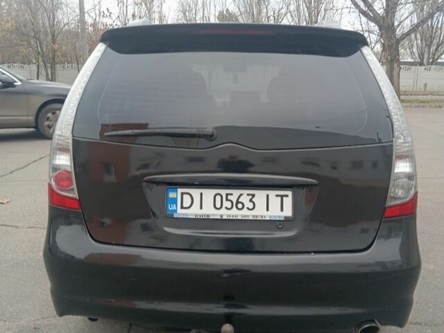 Черный Мицубиси Грандис, объемом двигателя 2.4 л и пробегом 272 тыс. км за 7000 $, фото 5 на Automoto.ua