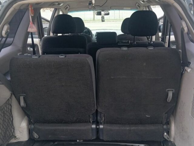 Черный Мицубиси Грандис, объемом двигателя 2.4 л и пробегом 272 тыс. км за 7000 $, фото 1 на Automoto.ua