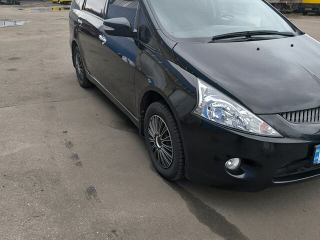 Черный Мицубиси Грандис, объемом двигателя 2.4 л и пробегом 62 тыс. км за 8500 $, фото 1 на Automoto.ua