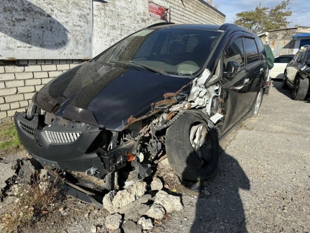 Черный Мицубиси Грандис, объемом двигателя 2.4 л и пробегом 220 тыс. км за 3200 $, фото 2 на Automoto.ua