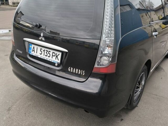 Черный Мицубиси Грандис, объемом двигателя 2.4 л и пробегом 62 тыс. км за 8500 $, фото 2 на Automoto.ua