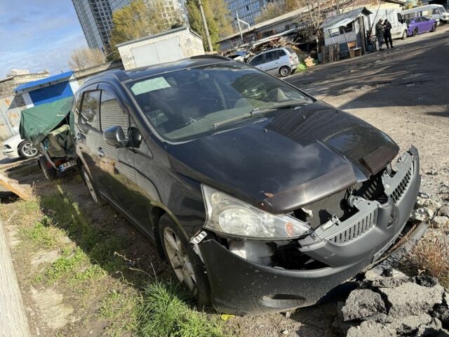 Черный Мицубиси Грандис, объемом двигателя 2.4 л и пробегом 220 тыс. км за 3200 $, фото 3 на Automoto.ua