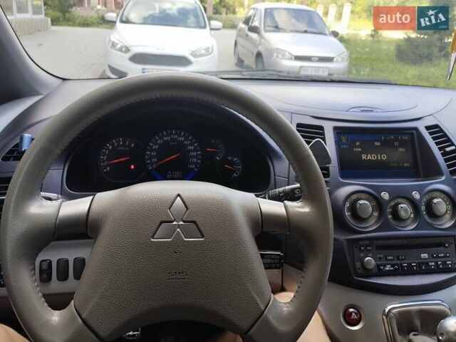Фиолетовый Мицубиси Грандис, объемом двигателя 2.4 л и пробегом 327 тыс. км за 5300 $, фото 13 на Automoto.ua