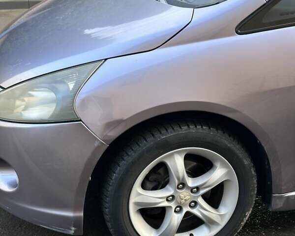 Фиолетовый Мицубиси Грандис, объемом двигателя 2.4 л и пробегом 280 тыс. км за 4799 $, фото 1 на Automoto.ua