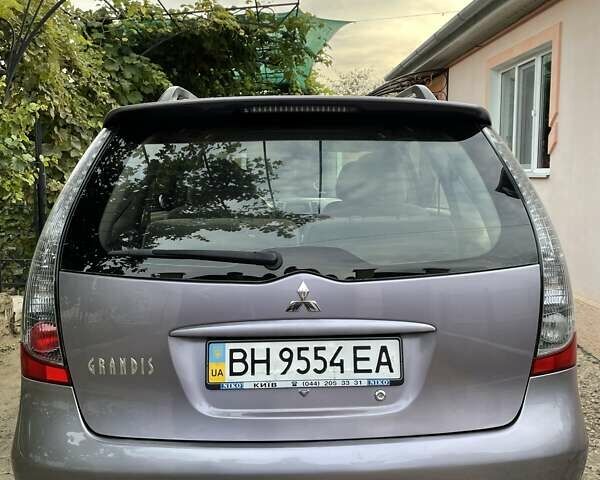 Фиолетовый Мицубиси Грандис, объемом двигателя 2.38 л и пробегом 200 тыс. км за 5500 $, фото 3 на Automoto.ua