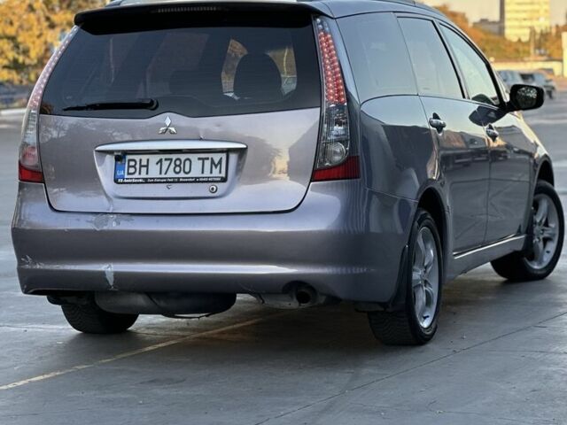 Мицубиси Грандис 2005 в Одессе на Automoto.ua Фиолетовый Мицубиси Грандис, объемом двигателя 2.4 л и пробегом 250 тыс. км за 5499 $, фото 3 на Automoto.ua