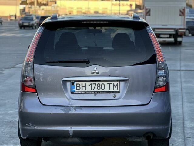 Мицубиси Грандис 2005 в Одессе на Automoto.ua Фиолетовый Мицубиси Грандис, объемом двигателя 2.4 л и пробегом 250 тыс. км за 5499 $, фото 5 на Automoto.ua