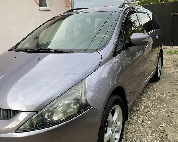 Фиолетовый Мицубиси Грандис, объемом двигателя 2.38 л и пробегом 200 тыс. км за 5500 $, фото 1 на Automoto.ua