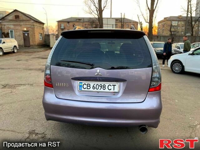 Фіолетовий Міцубісі Грандіс, об'ємом двигуна 2.4 л та пробігом 300 тис. км за 6500 $, фото 3 на Automoto.ua