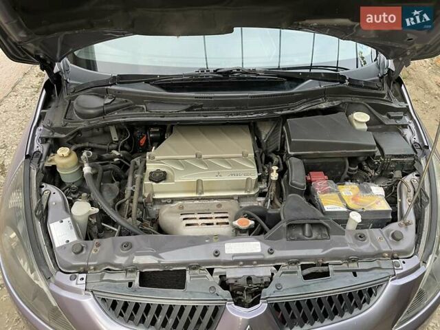 Фиолетовый Мицубиси Грандис, объемом двигателя 2.38 л и пробегом 200 тыс. км за 5500 $, фото 12 на Automoto.ua