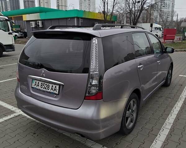 Фиолетовый Мицубиси Грандис, объемом двигателя 2.4 л и пробегом 257 тыс. км за 5400 $, фото 2 на Automoto.ua