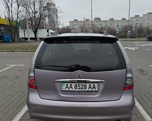 Фиолетовый Мицубиси Грандис, объемом двигателя 2.4 л и пробегом 257 тыс. км за 5400 $, фото 1 на Automoto.ua