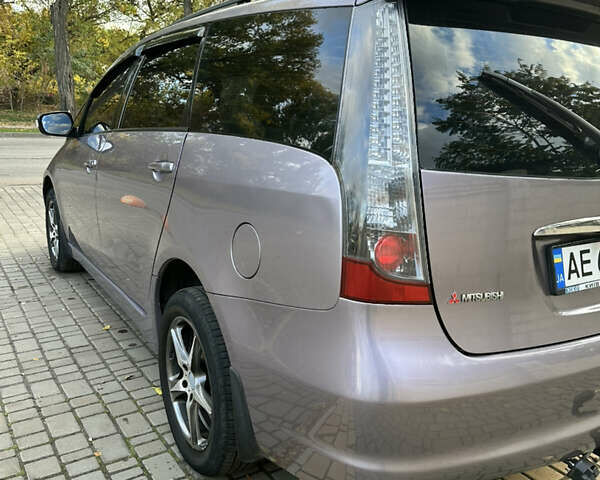 Фиолетовый Мицубиси Грандис, объемом двигателя 2.38 л и пробегом 261 тыс. км за 5400 $, фото 2 на Automoto.ua