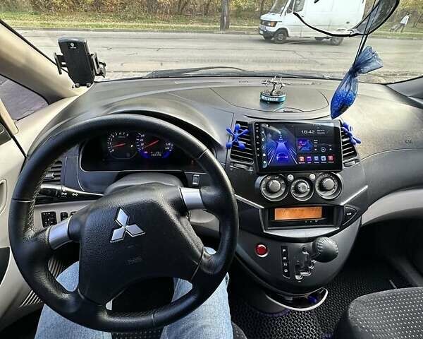 Мицубиси Грандис 2006 в Никополе на Automoto.ua Фиолетовый Мицубиси Грандис, объемом двигателя 2.4 л и пробегом 260 тыс. км за 5784 $, фото 19 на Automoto.ua