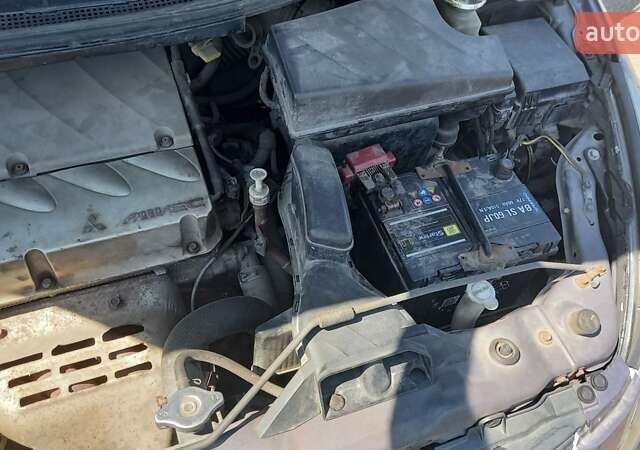 Фиолетовый Мицубиси Грандис, объемом двигателя 2.4 л и пробегом 228 тыс. км за 6780 $, фото 20 на Automoto.ua