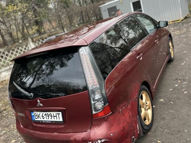 Красный Мицубиси Грандис, объемом двигателя 2.4 л и пробегом 300 тыс. км за 4850 $, фото 14 на Automoto.ua