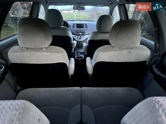 Червоний Міцубісі Грандіс, об'ємом двигуна 2.38 л та пробігом 341 тис. км за 3900 $, фото 10 на Automoto.ua