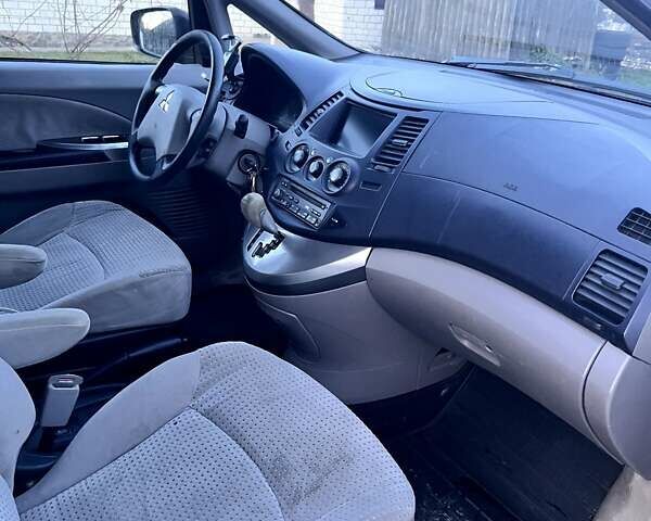 Червоний Міцубісі Грандіс, об'ємом двигуна 2.38 л та пробігом 341 тис. км за 3900 $, фото 13 на Automoto.ua