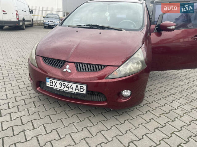 Красный Мицубиси Грандис, объемом двигателя 2.38 л и пробегом 117 тыс. км за 6999 $, фото 7 на Automoto.ua