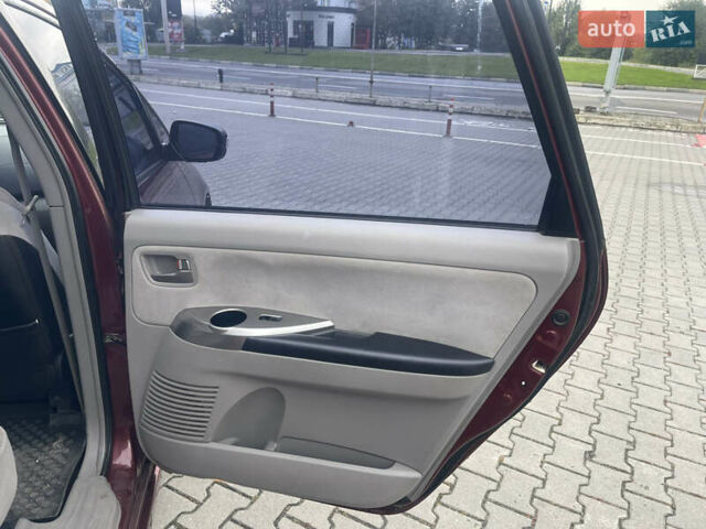 Красный Мицубиси Грандис, объемом двигателя 2.38 л и пробегом 117 тыс. км за 6999 $, фото 12 на Automoto.ua