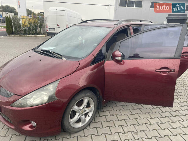Красный Мицубиси Грандис, объемом двигателя 2.38 л и пробегом 117 тыс. км за 6999 $, фото 6 на Automoto.ua