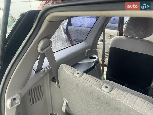 Красный Мицубиси Грандис, объемом двигателя 2.38 л и пробегом 117 тыс. км за 6999 $, фото 17 на Automoto.ua