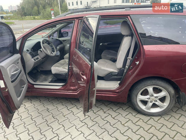Красный Мицубиси Грандис, объемом двигателя 2.38 л и пробегом 117 тыс. км за 7500 $, фото 24 на Automoto.ua
