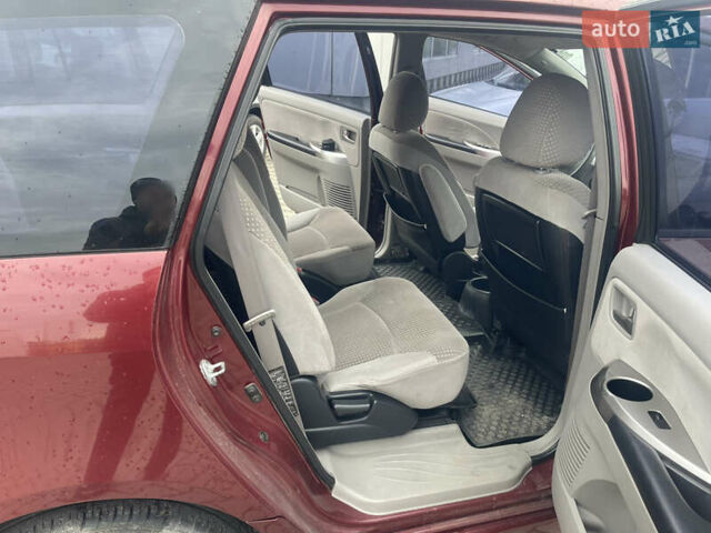 Красный Мицубиси Грандис, объемом двигателя 2.38 л и пробегом 117 тыс. км за 6999 $, фото 13 на Automoto.ua