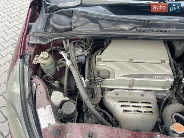 Красный Мицубиси Грандис, объемом двигателя 2.38 л и пробегом 117 тыс. км за 6999 $, фото 3 на Automoto.ua