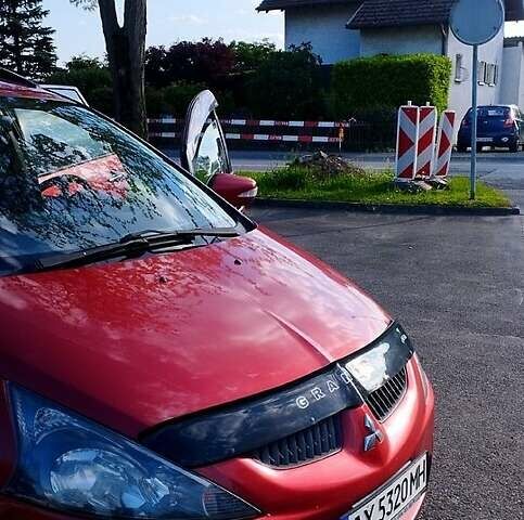 Красный Мицубиси Грандис, объемом двигателя 2.4 л и пробегом 220 тыс. км за 6100 $, фото 2 на Automoto.ua