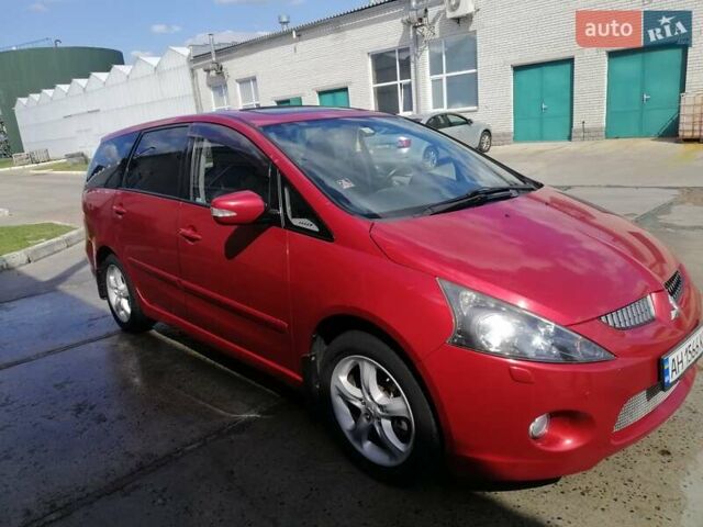 Красный Мицубиси Грандис, объемом двигателя 1.97 л и пробегом 235 тыс. км за 7100 $, фото 2 на Automoto.ua