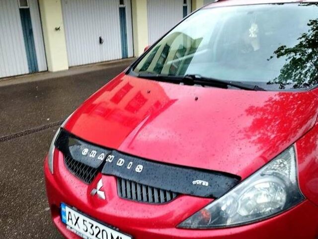 Красный Мицубиси Грандис, объемом двигателя 2.4 л и пробегом 220 тыс. км за 6100 $, фото 1 на Automoto.ua