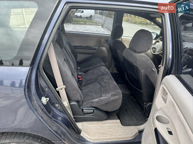 Сірий Міцубісі Грандіс, об'ємом двигуна 2.4 л та пробігом 396 тис. км за 3999 $, фото 26 на Automoto.ua