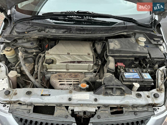 Серый Мицубиси Грандис, объемом двигателя 2.4 л и пробегом 263 тыс. км за 5300 $, фото 23 на Automoto.ua