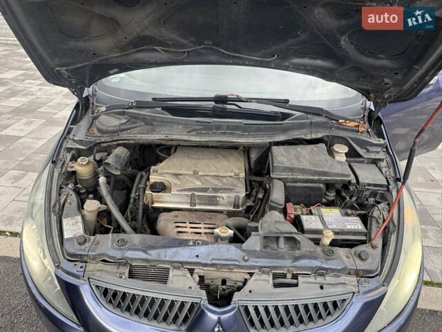 Сірий Міцубісі Грандіс, об'ємом двигуна 2.4 л та пробігом 396 тис. км за 3999 $, фото 35 на Automoto.ua