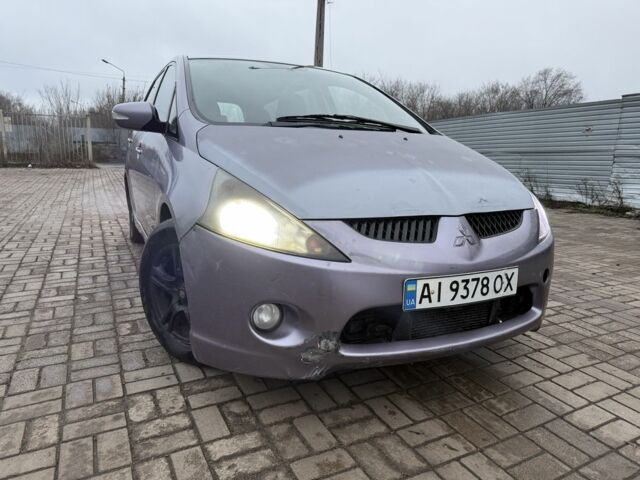 Серый Мицубиси Грандис, объемом двигателя 2 л и пробегом 200 тыс. км за 2450 $, фото 1 на Automoto.ua