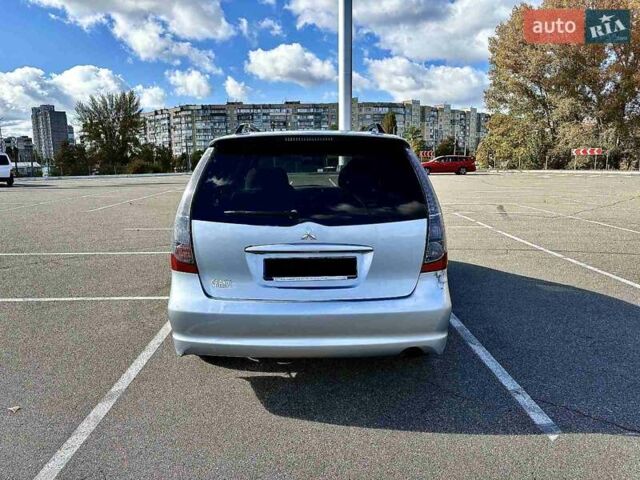 Серый Мицубиси Грандис, объемом двигателя 2.4 л и пробегом 227 тыс. км за 5100 $, фото 3 на Automoto.ua
