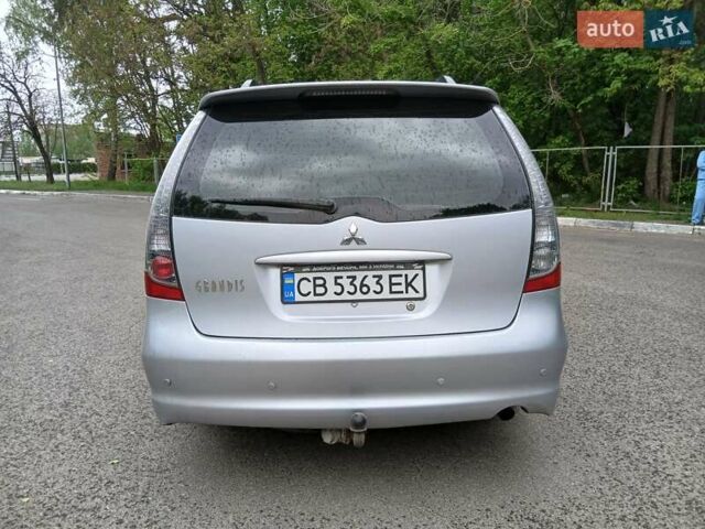 Сірий Міцубісі Грандіс, об'ємом двигуна 2.38 л та пробігом 244 тис. км за 5990 $, фото 6 на Automoto.ua