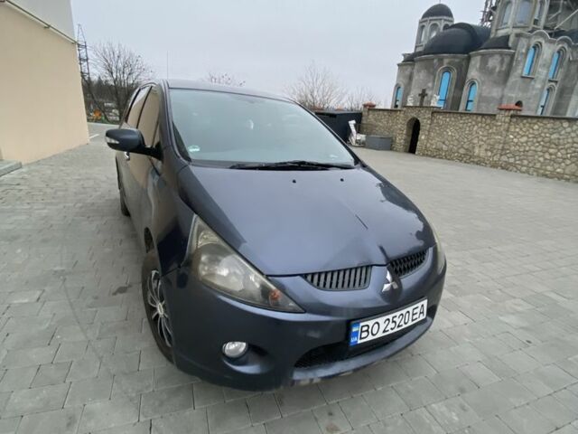 Серый Мицубиси Грандис, объемом двигателя 2 л и пробегом 290 тыс. км за 5700 $, фото 1 на Automoto.ua