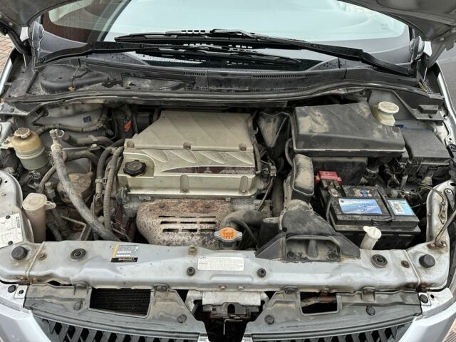 Серый Мицубиси Грандис, объемом двигателя 2.4 л и пробегом 263 тыс. км за 5300 $, фото 22 на Automoto.ua